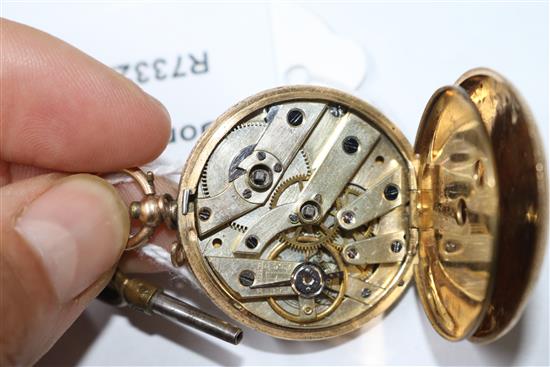 An 18ct gold open face fob watch.